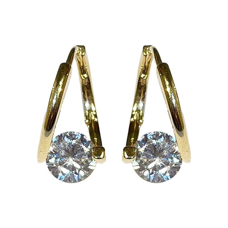 Boucle d'oreille Anneau Doré Point de Lumière